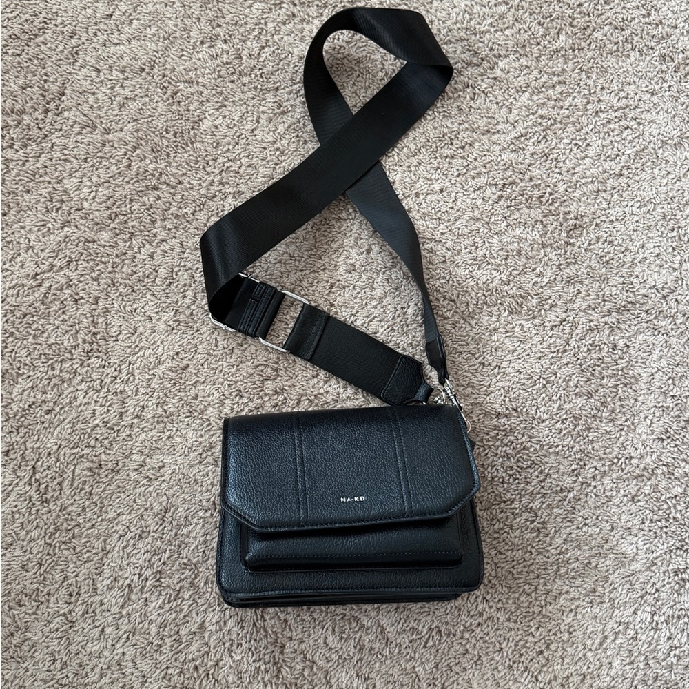 Sleek Black Crossbody Bag by DKNY